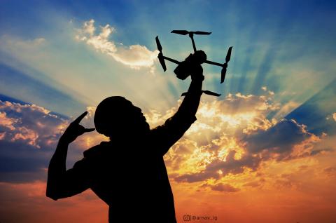 Man with drone in hand